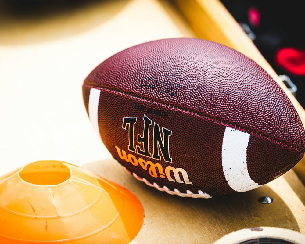Close up of sports equipment and a person preparing for exercise